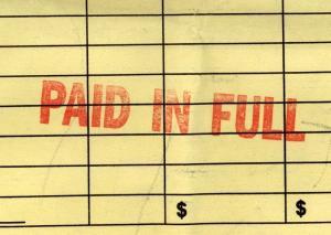 close up of a reciept reading paid in full