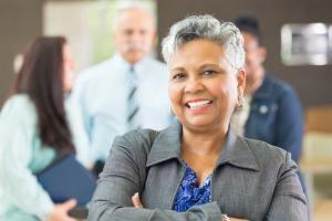 Senior businesswoman in a business office setting.