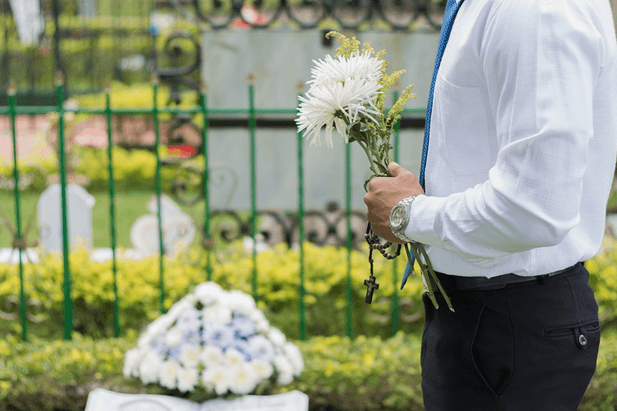 Man holding flowers