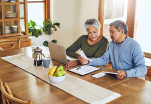 Couple reviewing insurance paperwork